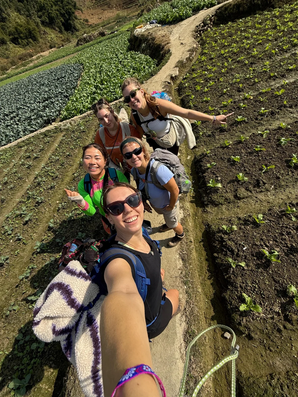 Nhu and guests smiling together on a Sapa trek